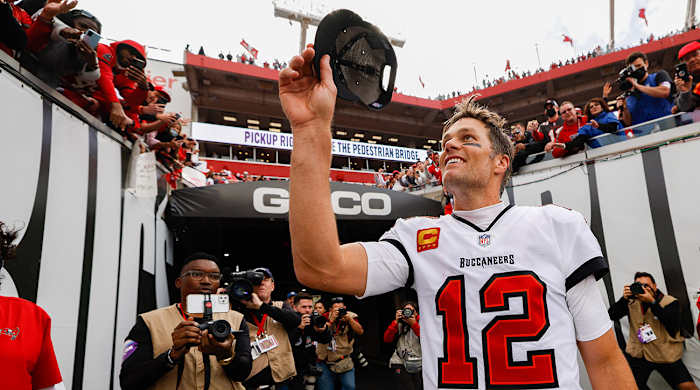 Tampa Bay Buccaneers quarterback Tom Brady (12) greets fans after beating the Philadelphia Eagles 31-15 in a NFC Wild Card playoff football game.